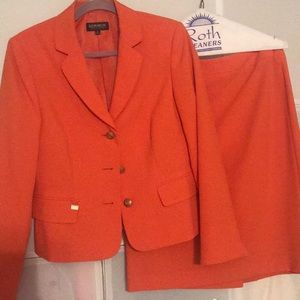 2 Piece orange skirt suit as 8